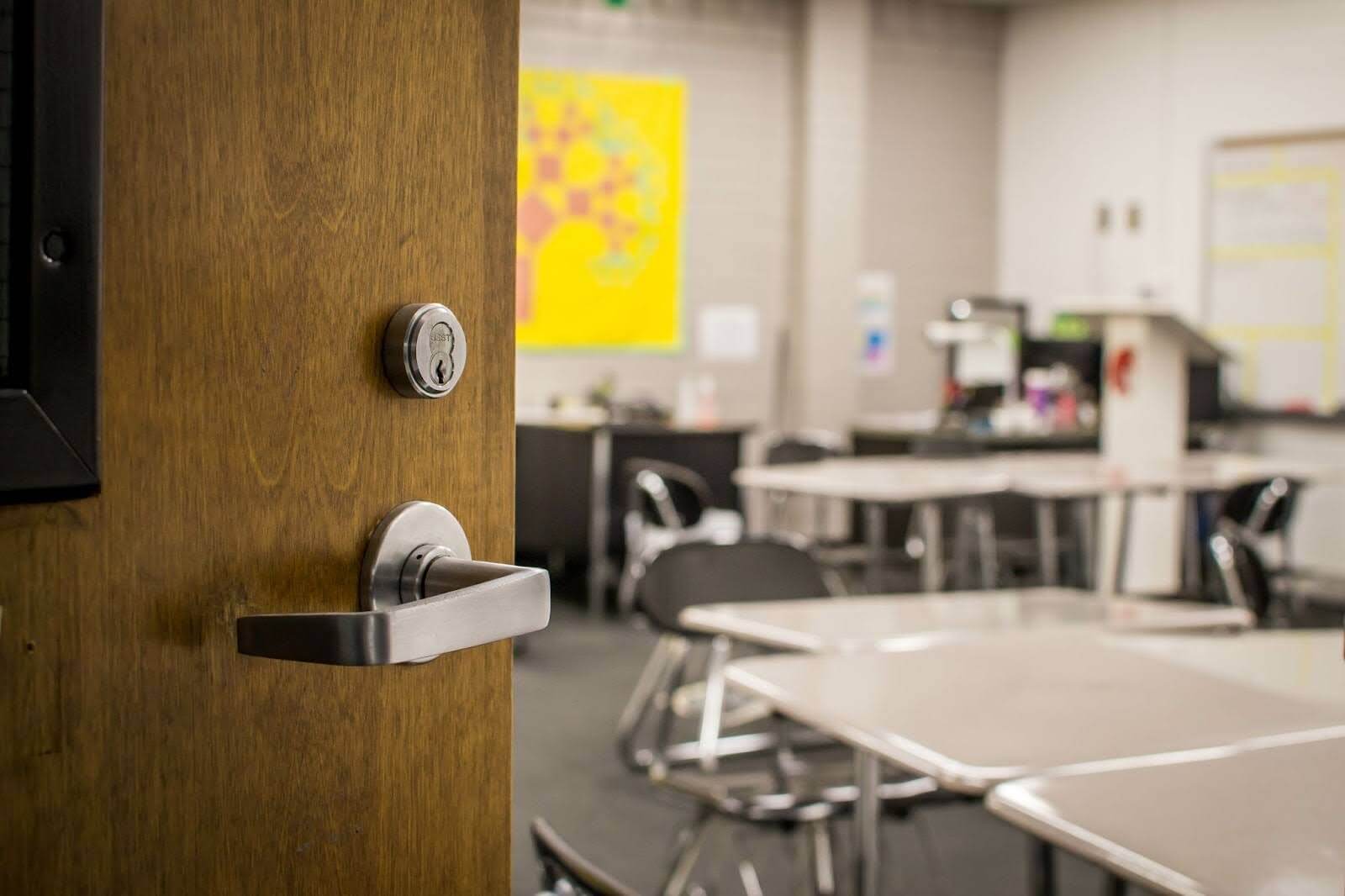 Opened door in a classroom.